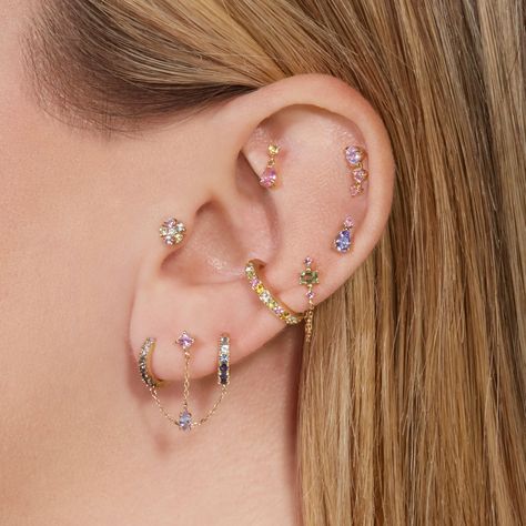 Elevate your ensemble with our elegant earring sets. Discover coordinated pairs in diverse styles—dangles, studs, hoops—crafted from quality materials for versatile, timeless accessorizing.