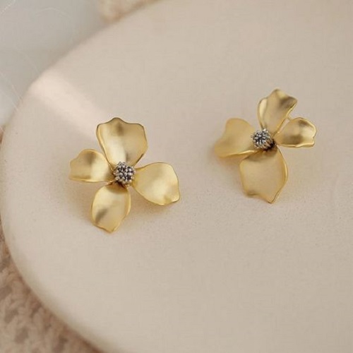 Illuminate your look with intricate small gold flower earrings