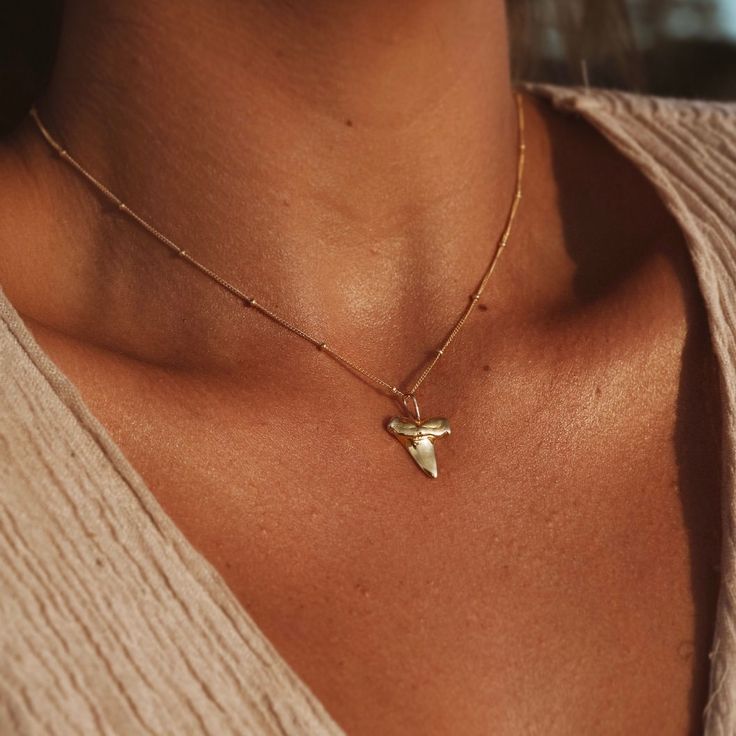 Craft your own shark tooth necklace