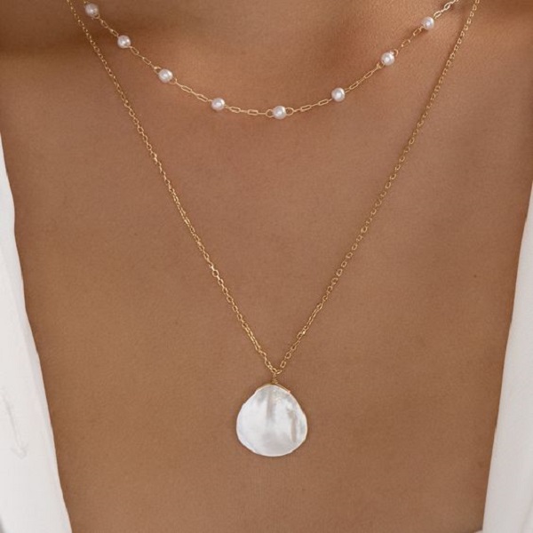 Learn how to create a beautiful seashell necklace