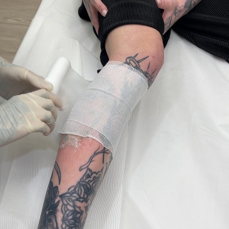 how long to keep wrap on tattoo